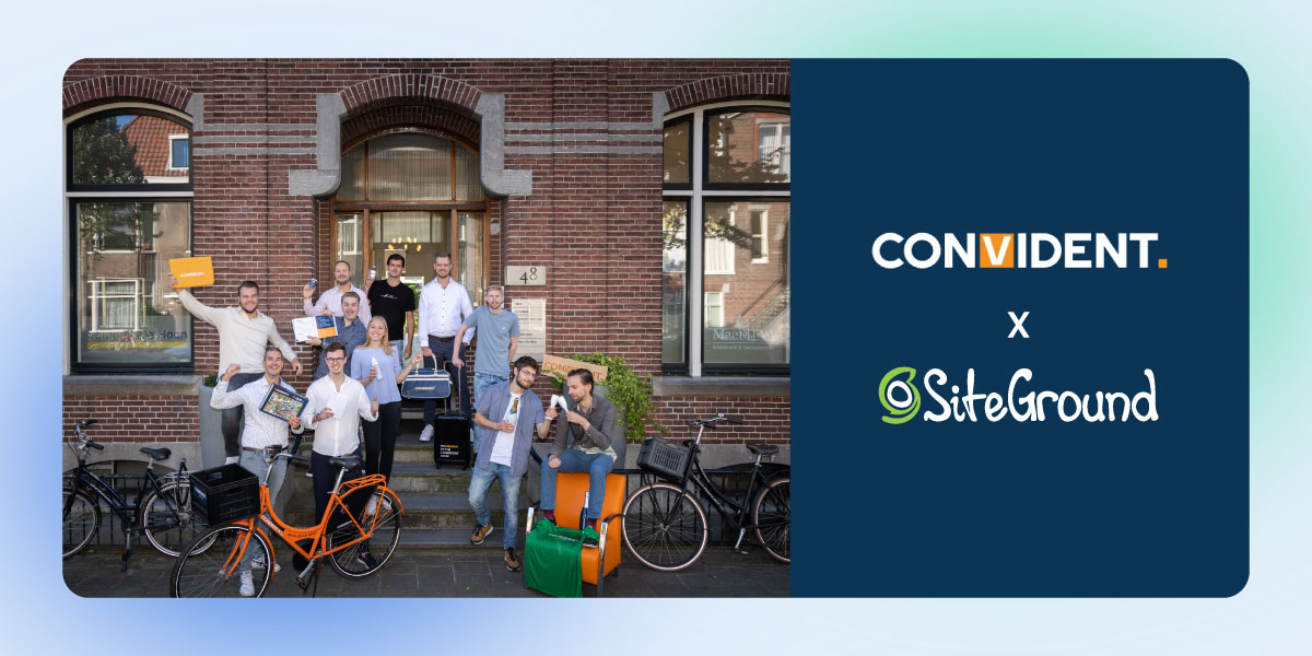 A group of cheerful people from Convident digital agency pose outside a brick building with bicycles, celebrating their team activity. The right side displays the Convident and SiteGround logos.